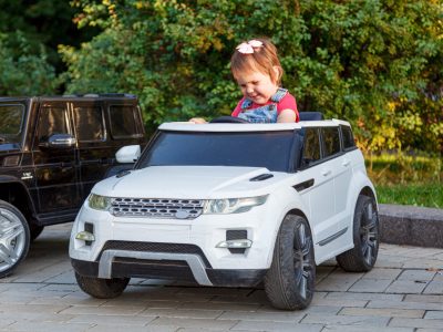 beautiful little girl in the car close-up